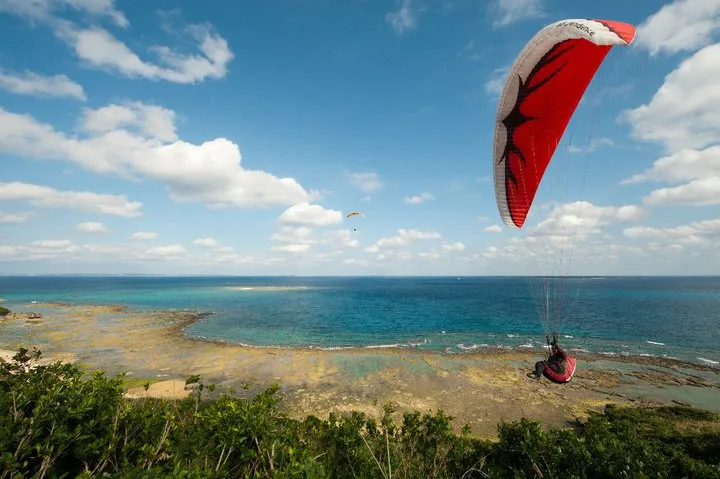 Paragliding over the Pacific Ocean, Okinawa, Japan